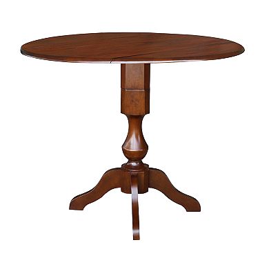 International Concepts Dual Drop Leaf Round Pedestal Dining Table