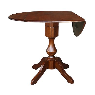 International Concepts Dual Drop Leaf Round Pedestal Dining Table