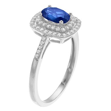 10k White Gold Sapphire & 1/3 Carat T.W. Diamond Halo Ring