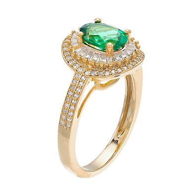 14k Gold Emerald & 1/2 Carat T.W. Diamond Oval Halo Ring