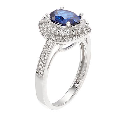 14k White Gold Sapphire & 1/2 Carat T.W. Diamond Halo Ring