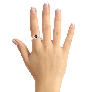 Alyson Layne 14k White Gold Garnet & 1/4 Carat T.W. Diamond Halo Ring