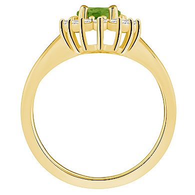Alyson Layne 14k Gold Oval Cut Peridot & 1/3 Carat T.W. Diamond Halo Ring