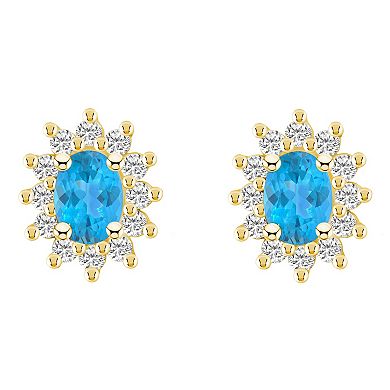 Alyson Layne 14k Gold Oval Blue Topaz 3/4 Carat T.W. Diamond Halo Stud Earrings