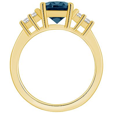 Alyson Layne 14k Gold Oval London Blue Topaz & 1/3 Carat T.W. Diamond Ring