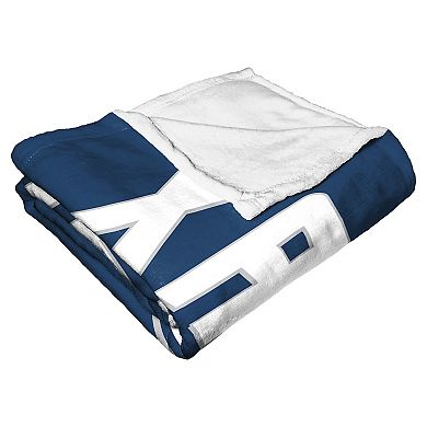 The Northwest Xavier Musketeers Alumni Silk-Touch Throw Blanket