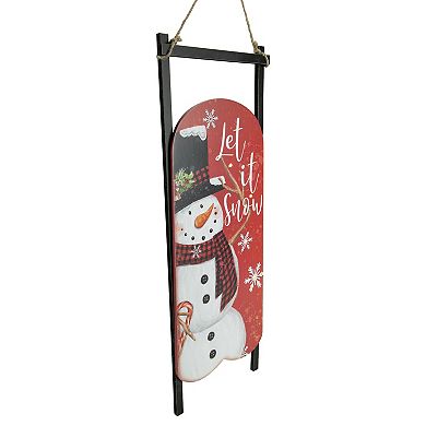 21.75" LED Lighted 'Let it Snow' Snowman Sled Christmas Wall Sign