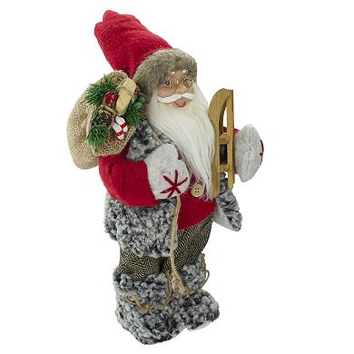 12" Standing Santa Christmas Figure Carrying Presents and a Sled