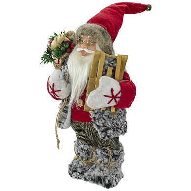 12" Standing Santa Christmas Figure Carrying Presents and a Sled