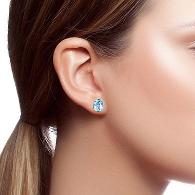 Sterling Silver Oval Blue Topaz Stud Earrings