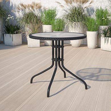 Emma and Oliver 28" Round Tempered Glass Metal Table with Rattan Edging