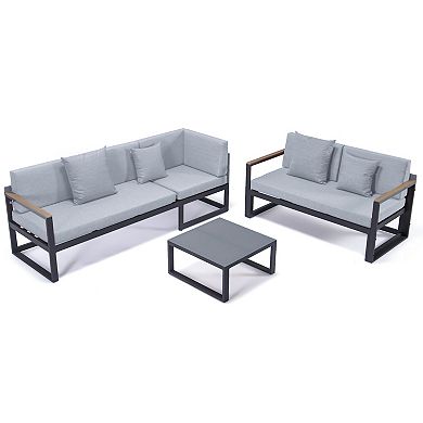 LeisureMod Chelsea Black Sectional With Adjustable Headrest & Coffee Table With Cushions