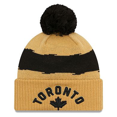 Men's New Era  Gold Toronto Raptors 2023/24 City Edition Cuffed Pom Knit Hat
