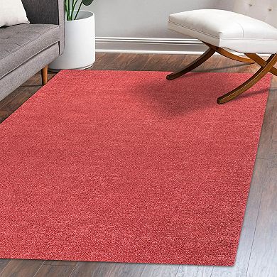 Haze Solid Low Pile Area Rug Red