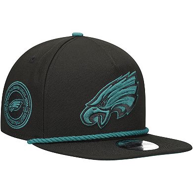Men's New Era Black Philadelphia Eagles Captain Snapback Hat