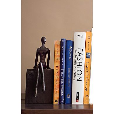 Bookend Set With Man And Woman Sitting On A Block