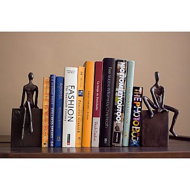Bookend Set With Man And Woman Sitting On A Block