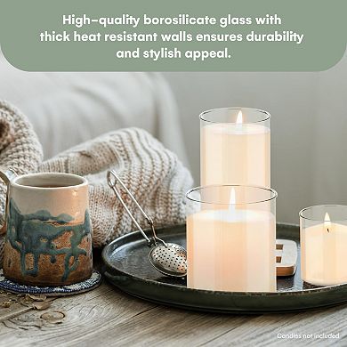 Trio Of Glass Candle Holders In Different Sizes