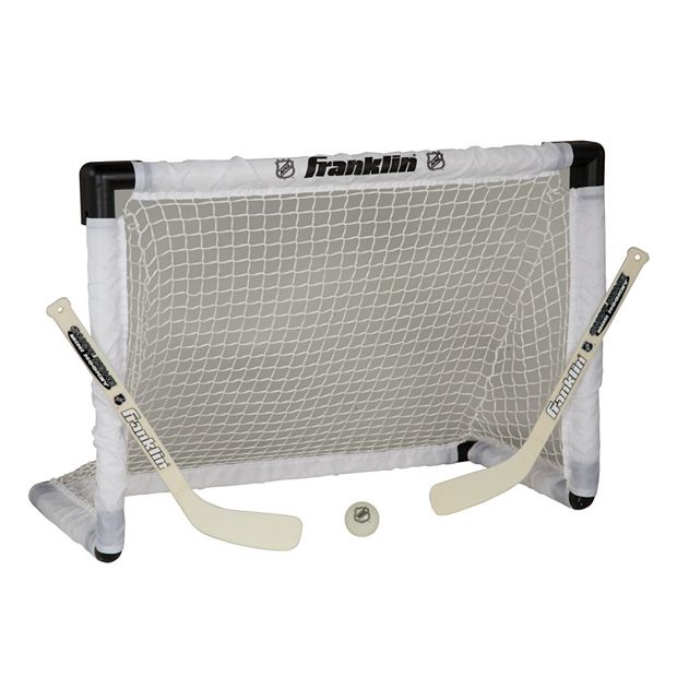 Franklin Sports NHL Kids Mini Hockey Goal + Sticks Set -36