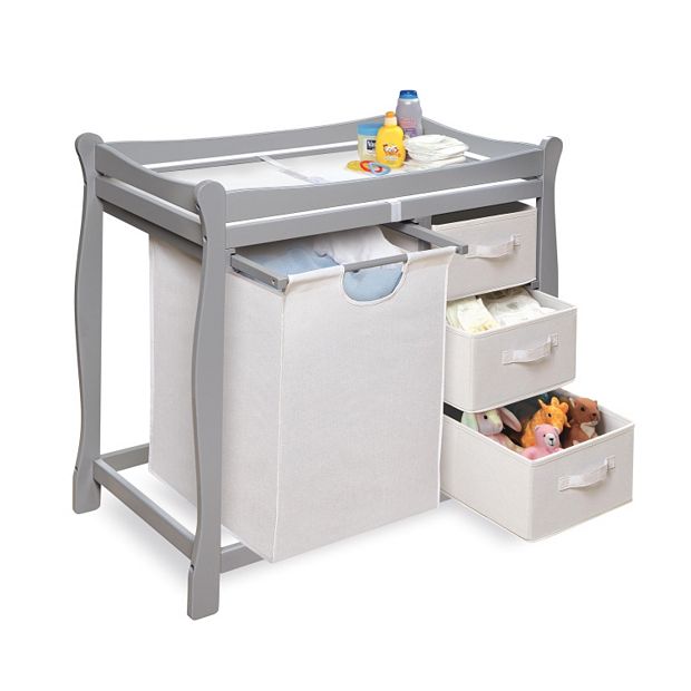 Baby changing outlet table with hamper