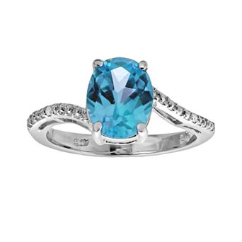 Gemminded Sterling Silver Blue Topaz and Diamond Accent Oval Ring