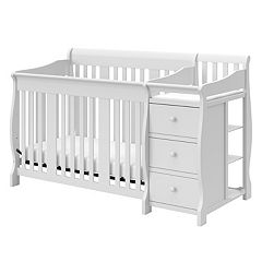 Gray convertible crib with changing outlet table