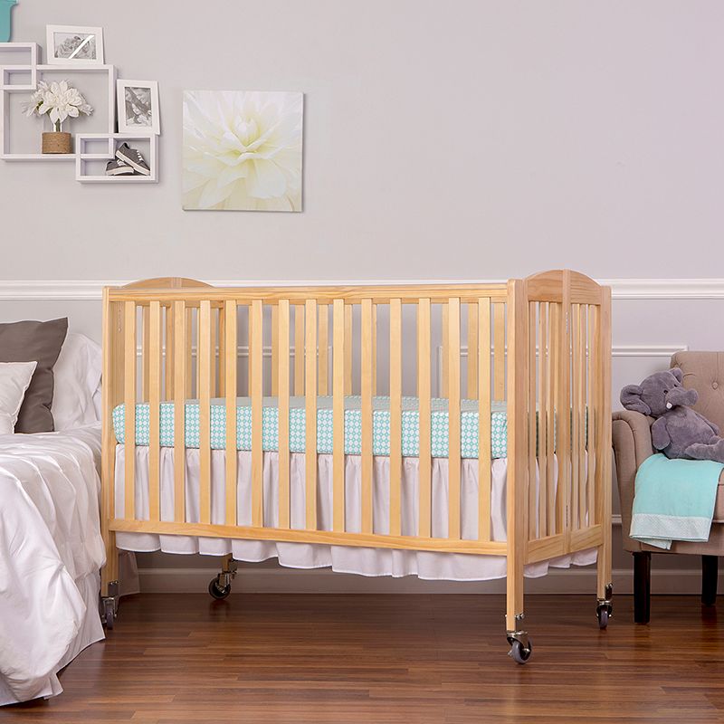 Dream On Me Folding Full Size Convenience Crib in Natural  Comes With Heavy Duty Locking Wheels