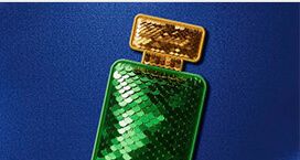 Image of a green sequinned fragrance bottle