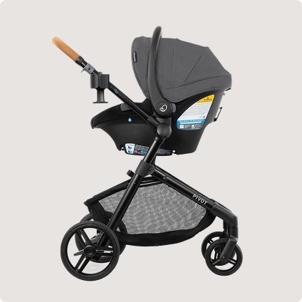 Black car seat docked in stroller