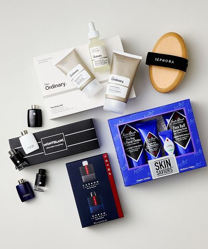 Various Father's day gift idea products arranged on a beige background.