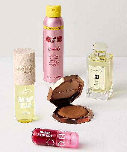 Assorted summer fragrances and makeup products