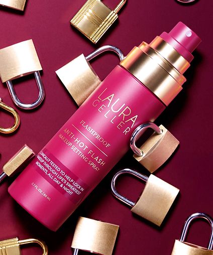 Laura Geller pink facial spray bottle