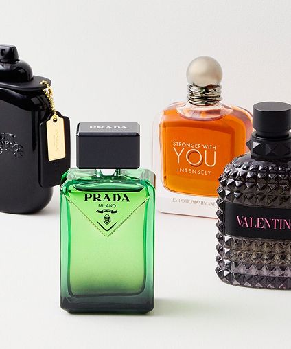 Four diverse designer fragrance bottles