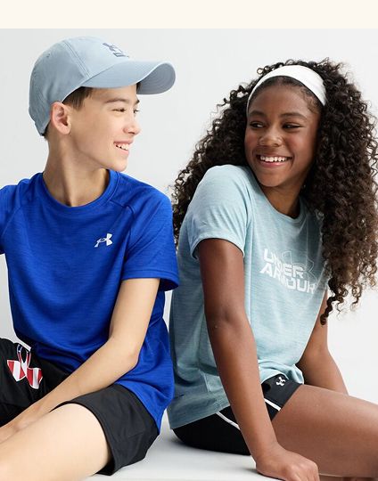 Teens laughing in athletic wear
