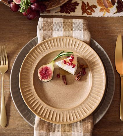 Thanksgiving plate setting with fresh fig