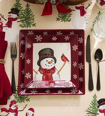 Holiday table setting with snowman plate