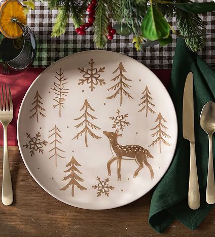 Holiday plate featuring deer and trees