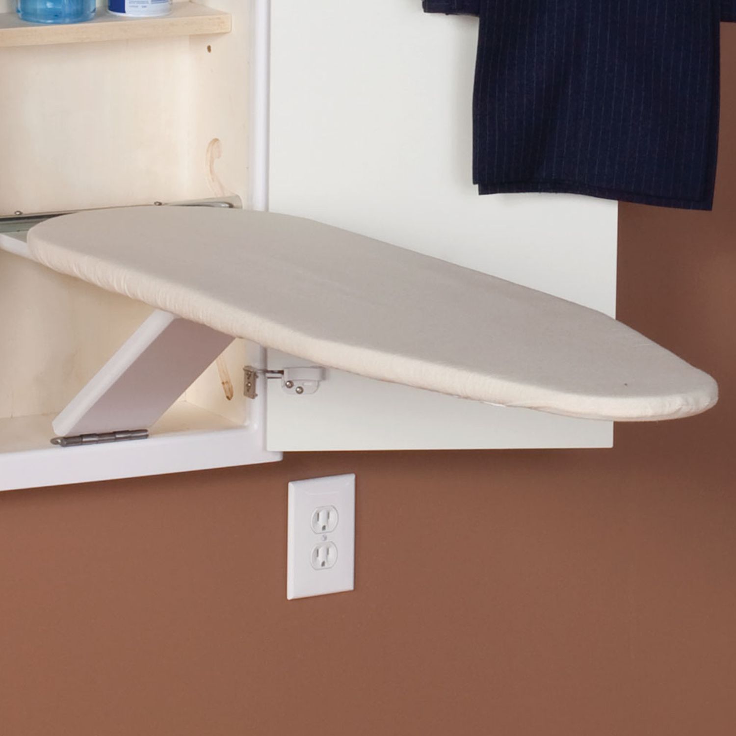 A compact fold-out ironing board is a laundry room essential that won't take up too much space.