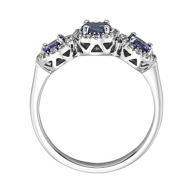 The Regal Collection 14k White Gold Genuine Tanzanite and 1/5-ct. T.W. Diamond 3-Stone Halo Ring