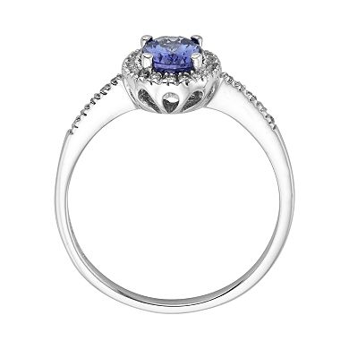 The Regal Collection 14k White Gold Genuine Tanzanite and 1/7-ct. T.W. Diamond Halo Ring