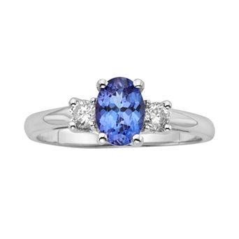 The Regal Collection Genuine Tanzanite & 1/5 Carat T.W. Diamond 14k White Gold 3-Stone Ring