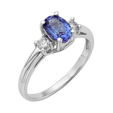 The Regal Collection Genuine Tanzanite and 1/5 Carat T.W. Diamond 14k White Gold 3-Stone Ring