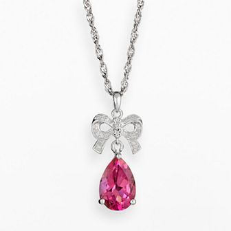 Celebration Gems Sterling Silver Pink Topaz and Diamond Accent Bow Pendant