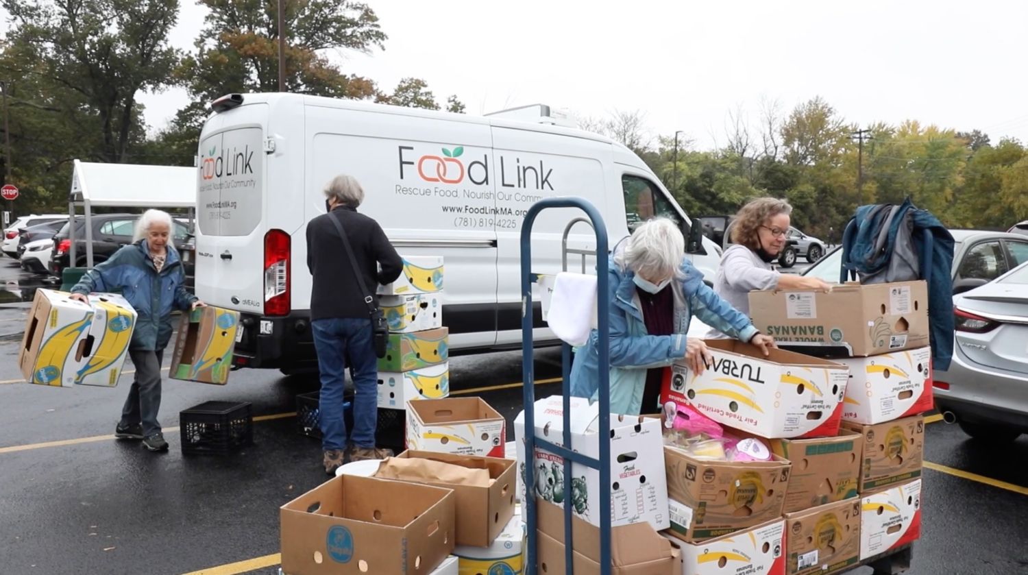volunteers helping at a food donation site