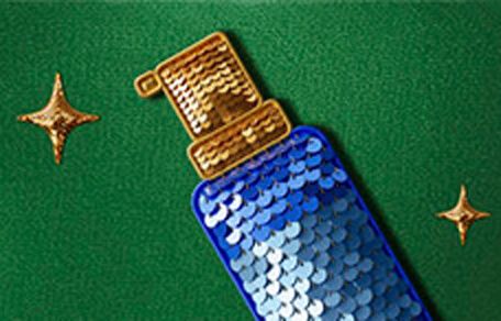 Image of a blue sequinned spray bottle