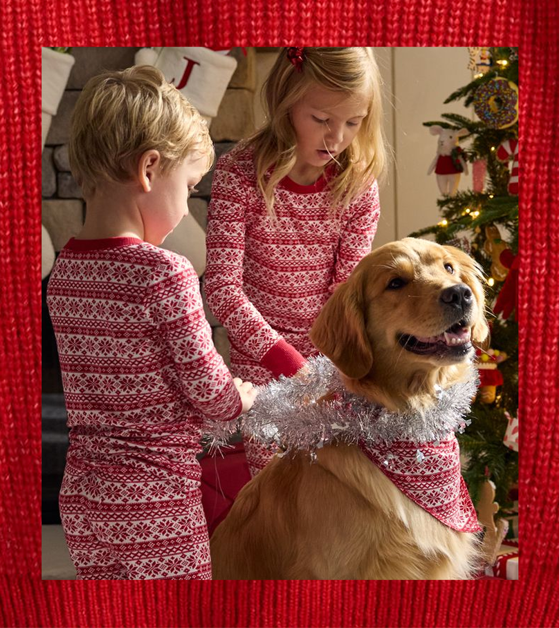 children playing with their dog in cozy pajamas