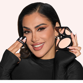 Image of model applying powder makeup