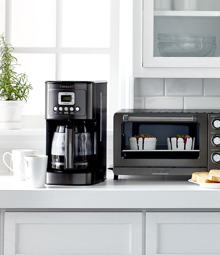 Kitchen countertop with various appliances.