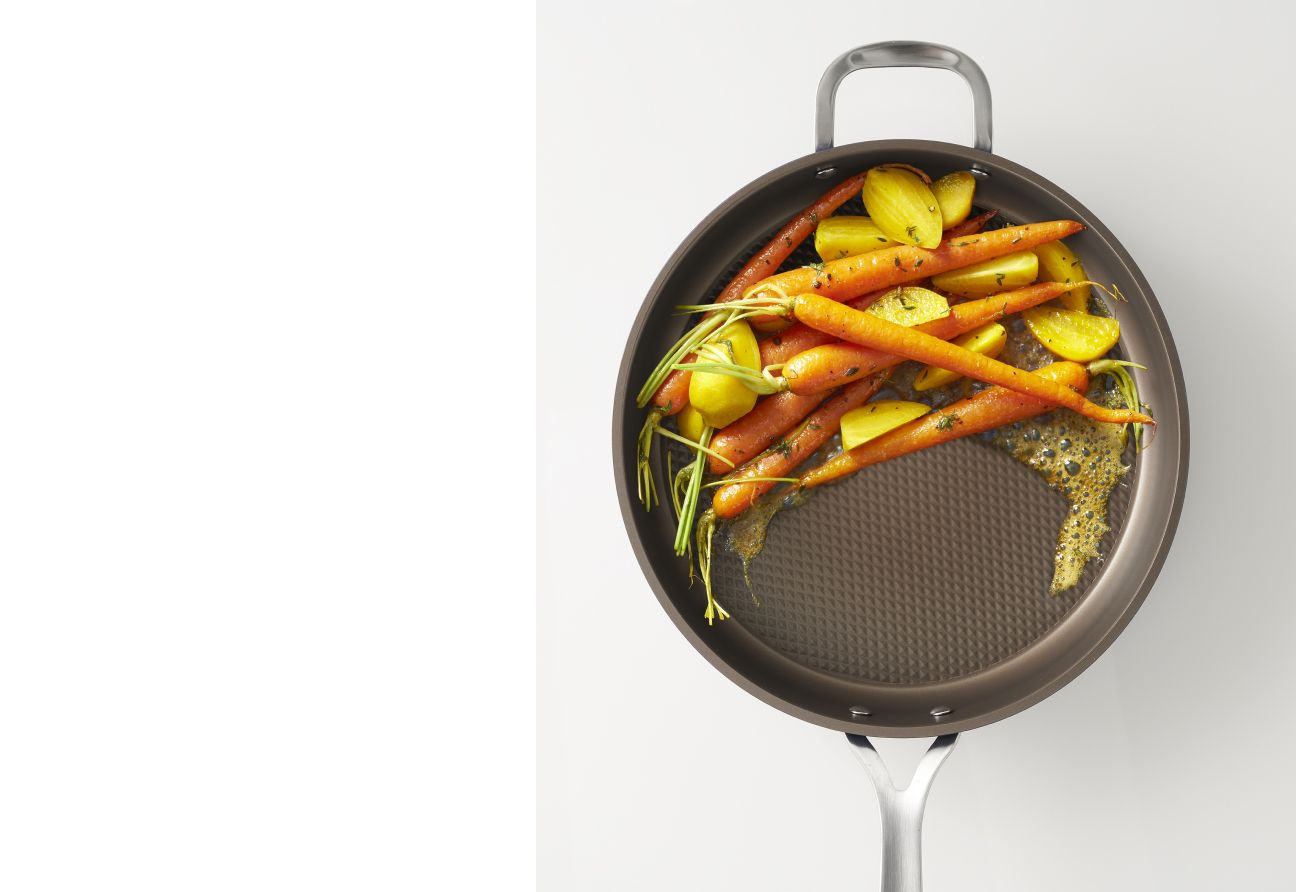 Frying Pan filled with carrots and potatoes