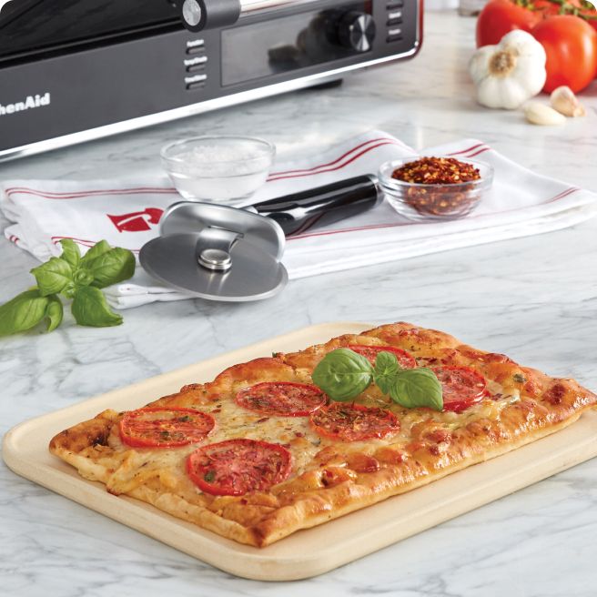 Pizza Stone with a pizza on it